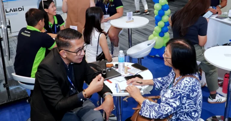 Entrepreneurs networking and exploring business opportunities at the PHILSME Business Expo in Manila.
